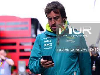 Fernando Alonso of Aston Martin Cognizant F1 Team is arriving in the paddock after the race of the Belgian GP, the 14th race of the Formula...