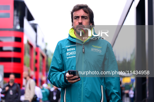 Fernando Alonso of Aston Martin Cognizant F1 Team is arriving in the paddock after the race of the Belgian GP, the 14th race of the Formula...