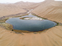 A view of Ma Lake, deep in the Badain Jaran Desert, in Inner Mongolia, China, on May 2, 2020. On July 26, 2024, at the 46th session of the U...