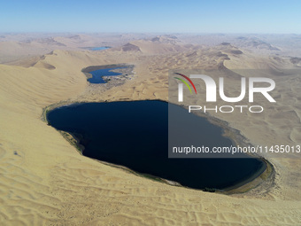 A view of Nanhaizi Lake, deep in the Badain Jaran Desert, in Inner Mongolia, China, on May 9, 2020. On July 26, 2024, at the 46th session of...