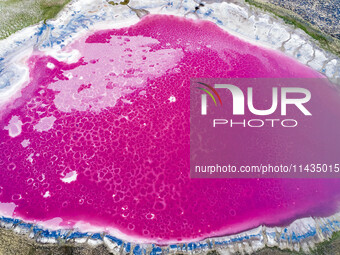 A photo taken on May 1, 2020, is showing the view of Pink Lake deep in Badain Jaran Desert in Inner Mongolia, China. On July 26, 2024, at th...