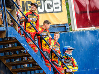 (Left to Right): Leicester Lions' riders Sam Masters, Craig Cook, Ryan Douglas, and Sam Hagon are standing on the steps to watch the first h...