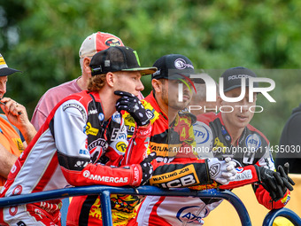 (Left to Right) Belle Vue Aces' Dan Bewley, Leicester Lions' Luke Becker, and Belle Vue Aces' Ben Cook are watching the first heat during th...