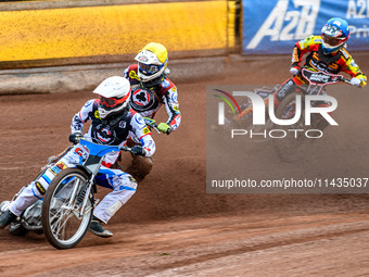 Belle Vue Aces' Antti Vuolas in white and teammate Jake Mulford in yellow are leading Leicester Lions' Sam Hagon in blue during the Rowe Mot...