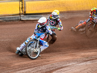 Belle Vue Aces' Antti Vuolas in white and teammate Jake Mulford in yellow are leading Leicester Lions' Sam Hagon in blue during the Rowe Mot...