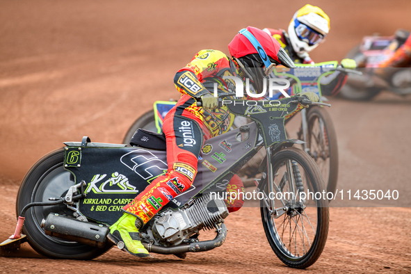 Leicester Lions' Craig Cook in red is leading Belle Vue Aces' Jake Mulford in yellow during the Rowe Motor Oil Premiership match between Lei...