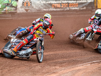 Leicester Lions' Sam Masters in Red is leading Belle Vue Aces' Ben Cook in Yellow and Belle Vue Aces' Jaimon Lidsey in White during the Rowe...