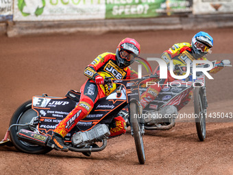 Leicester Lions' Sam Masters in red is leading teammate Luke Becker in blue during the Rowe Motor Oil Premiership match between Leicester Li...