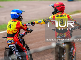 Leicester Lions' Luke Becker in blue and teammate Sam Masters are celebrating their 5-1 heat win during the Rowe Motor Oil Premiership match...