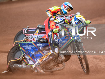 Belle Vue Aces' Jake Mulford in Yellow is leading Leicester Lions' Sam Hagon in Blue during the Rowe Motor Oil Premiership match between Lei...