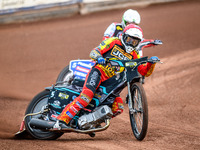 Leicester Lions' Ryan Douglas in Red is leading Belle Vue Aces' Dan Bewley in White during the Rowe Motor Oil Premiership match between Leic...