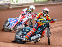 Leicester Lions' Ryan Douglas in Red is leading Belle Vue Aces' Dan Bewley in White during the Rowe Motor Oil Premiership match between Leic...