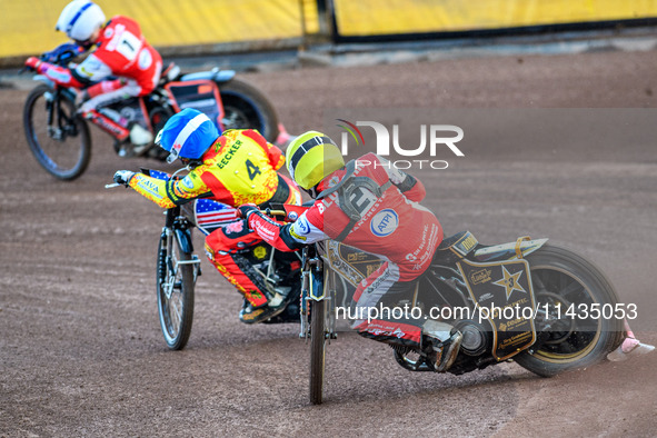 Belle Vue Aces' Norick Blodorn in Yellow is chasing Leicester Lions' Luke Becker in Blue and Belle Vue Aces' Brady Kurtz in White during the...