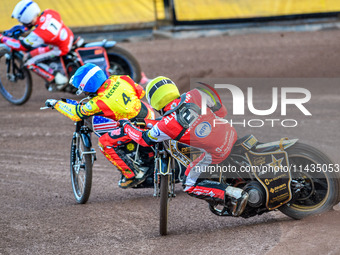 Belle Vue Aces' Norick Blodorn in Yellow is chasing Leicester Lions' Luke Becker in Blue and Belle Vue Aces' Brady Kurtz in White during the...