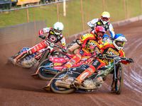 Leicester Lions' Richard Lawson in Blue is leading Leicester Lions' Max Fricke in Red, Belle Vue Aces' Dan Bewley in White, and Belle Vue Ac...