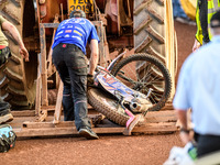 Belle Vue Aces' Dan Bewley's damaged bike is being taken back to the pits after the crash during the Rowe Motor Oil Premiership match betwee...