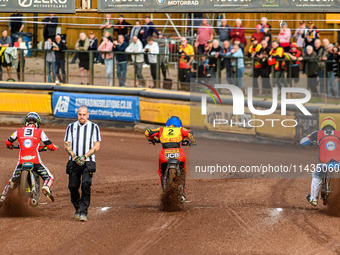 (L to R) Belle Vue Aces' Jaimon Lidsey in White, Leicester Lions' Richard Lawson in Blue, and Belle Vue Aces' Antti Vuolas in Yellow are lea...