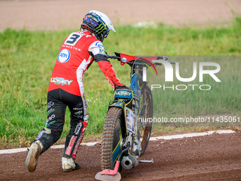 Belle Vue Aces' Jaimon Lidsey is pushing his bike off the track after his fall during the Rowe Motor Oil Premiership match between Leicester...