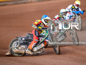 Richard Lawson of Leicester Lions in Blue is leading Jaimon Lidsey of Belle Vue Aces in White and Antti Vuolas of Belle Vue Aces in Yellow d...