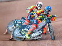 Leicester Lions' Craig Cook in blue is leading teammate Ryan Douglas during the Rowe Motor Oil Premiership match between Leicester Lions and...