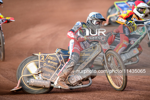 Belle Vue Aces' Norick Blodorn is riding outside Leicester Lions' Richard Lawson during the Rowe Motor Oil Premiership match between Leicest...