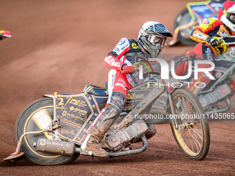 Belle Vue Aces' Norick Blodorn is riding outside Leicester Lions' Richard Lawson during the Rowe Motor Oil Premiership match between Leicest...