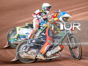 Richard Lawson of Leicester Lions in blue is leading Jaimon Lidsey of Belle Vue Aces in white during the Rowe Motor Oil Premiership match be...