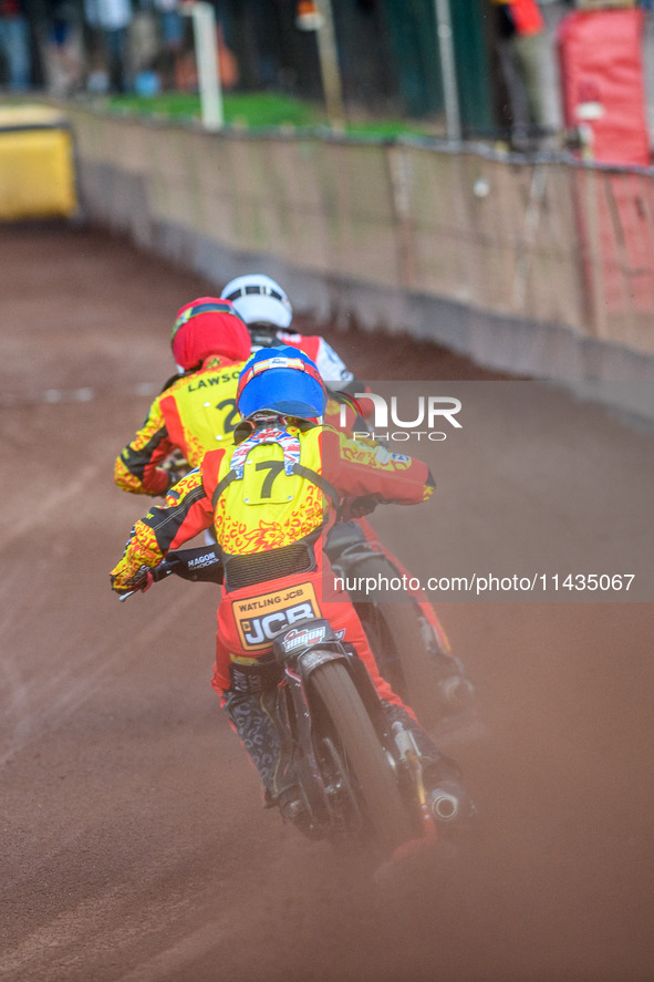 Leicester Lions' Sam Hagon in Blue is chasing Leicester Lions' Richard Lawson in Red and Belle Vue Aces' Norick Blodorn in White during the...