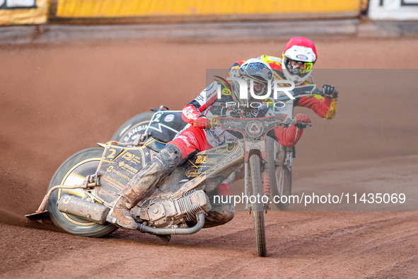 Norick Blodorn of Belle Vue Aces in White is leading Richard Lawson of Leicester Lions in Red during the Rowe Motor Oil Premiership match be...