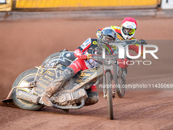 Norick Blodorn of Belle Vue Aces in White is leading Richard Lawson of Leicester Lions in Red during the Rowe Motor Oil Premiership match be...