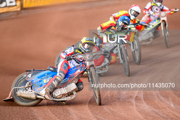 Belle Vue Aces' Ben Cook in Yellow is leading Leicester Lions' Craig Cook in Blue, Leicester Lions' Ryan Douglas in Red, and Belle Vue Aces'...