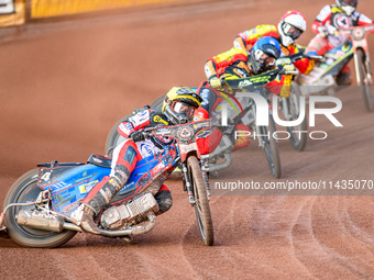 Belle Vue Aces' Ben Cook in Yellow is leading Leicester Lions' Craig Cook in Blue, Leicester Lions' Ryan Douglas in Red, and Belle Vue Aces'...