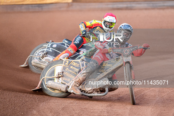 Norick Blodorn of Belle Vue Aces in White is leading Richard Lawson of Leicester Lions in Red during the Rowe Motor Oil Premiership match be...