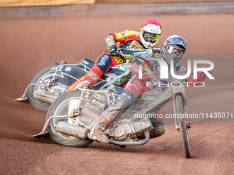 Norick Blodorn of Belle Vue Aces in White is leading Richard Lawson of Leicester Lions in Red during the Rowe Motor Oil Premiership match be...