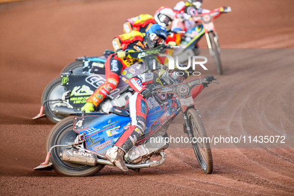 Belle Vue Aces' Ben Cook in Yellow is leading Leicester Lions' Craig Cook in Blue, Leicester Lions' Ryan Douglas in Red, and Belle Vue Aces'...