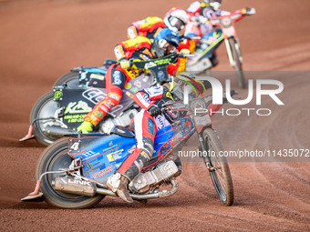 Belle Vue Aces' Ben Cook in Yellow is leading Leicester Lions' Craig Cook in Blue, Leicester Lions' Ryan Douglas in Red, and Belle Vue Aces'...