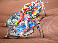 Belle Vue Aces' Ben Cook in Yellow is leading Leicester Lions' Craig Cook in Blue, Leicester Lions' Ryan Douglas in Red, and Belle Vue Aces'...