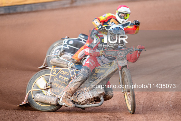 Norick Blodorn of Belle Vue Aces in White is leading Richard Lawson of Leicester Lions in Red during the Rowe Motor Oil Premiership match be...