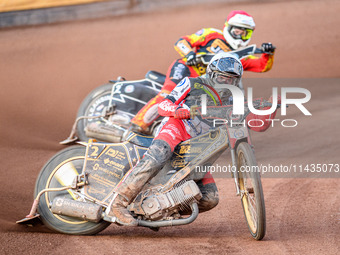 Norick Blodorn of Belle Vue Aces in White is leading Richard Lawson of Leicester Lions in Red during the Rowe Motor Oil Premiership match be...