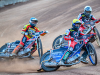 Belle Vue Aces' Brady Kurtz in Yellow is leading Leicester Lions' Luke Becker in Blue and Belle Vue Aces' Norick Blodorn in White during the...