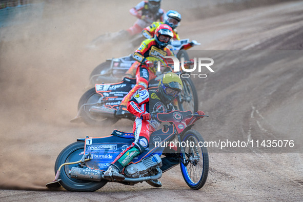 Belle Vue Aces' Brady Kurtz in Yellow is leading Leicester Lions' Sam Masters in Red, Leicester Lions' Luke Becker in Blue, and Belle Vue Ac...