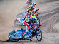 Belle Vue Aces' Brady Kurtz in Yellow is leading Leicester Lions' Sam Masters in Red, Leicester Lions' Luke Becker in Blue, and Belle Vue Ac...