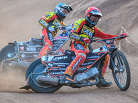 Leicester Lions' Sam Masters in red is leading teammate Luke Becker during the Rowe Motor Oil Premiership match between Leicester Lions and...