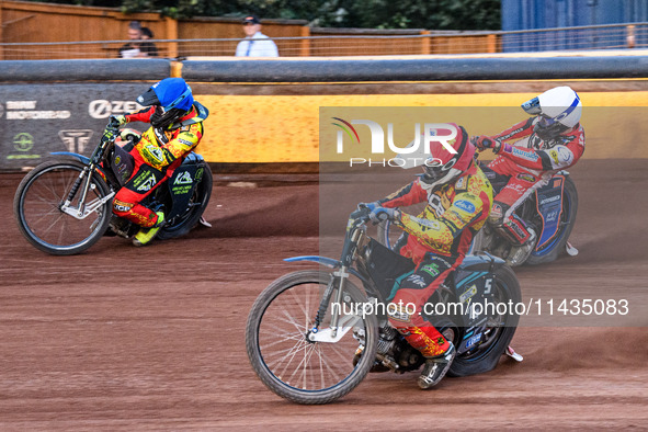 Leicester Lions' Ryan Douglas in Red is riding inside Leicester Lions' Craig Cook in Blue with Belle Vue Aces' Brady Kurtz in White behind d...