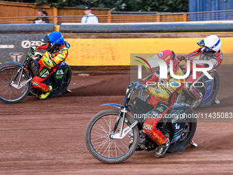 Leicester Lions' Ryan Douglas in Red is riding inside Leicester Lions' Craig Cook in Blue with Belle Vue Aces' Brady Kurtz in White behind d...