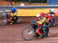 Leicester Lions' Ryan Douglas in Red is riding inside Leicester Lions' Craig Cook in Blue with Belle Vue Aces' Brady Kurtz in White behind d...