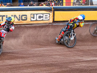 Belle Vue Aces' Ben Cook in Yellow is leading Leicester Lions' Ryan Douglas in Blue as Belle Vue Aces' Brady Kurtz in White is picking up so...