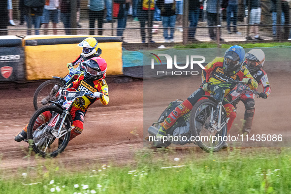 Leicester Lions' Luke Becker in Red is leading Leicester Lions' Craig Cook in Blue with Leicester Lions' Sam Hagon in Yellow on the outside...