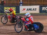 Belle Vue Aces' Ben Cook in white is chasing Leicester Lions' Sam Masters in red during the Rowe Motor Oil Premiership match between Leicest...