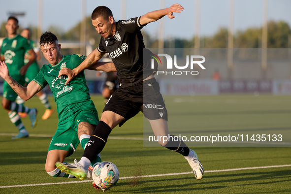 Joao Mendes (right) of Vitoria SC is being challenged by Alejandro Garzia (left) of Floriana during the UEFA Europa Conference League, Secon...